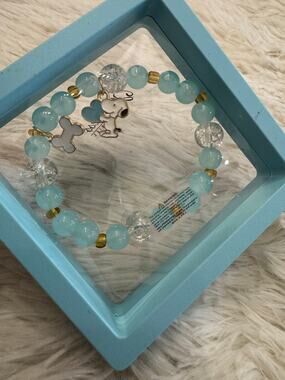 Snoopy blue and gold beaded bracelet clear and light blue beads snoopy charm
